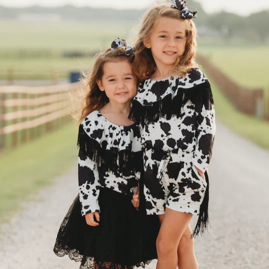 CLEARANCE - Shea Baby - Girls- Cowprint Off Shoulder Fringe